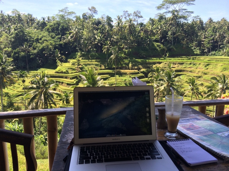 Tyler Tringas' workstation on a balcony overlooking a rice terrace.