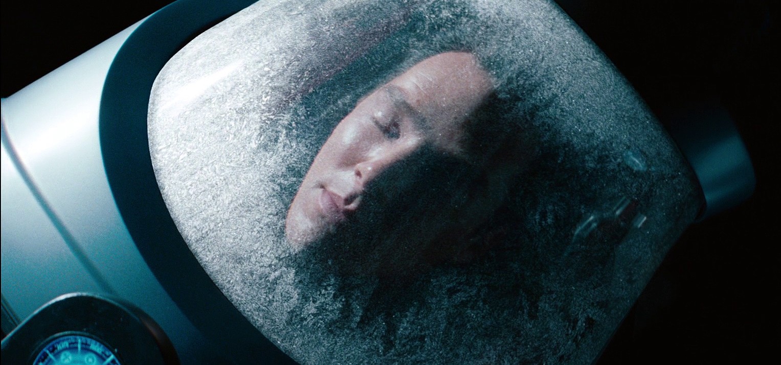 A man is hibernating in a cryo chamber, the ultimate air conditioner.