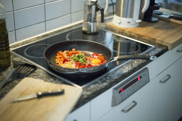 cooking in a small apartment kitchen