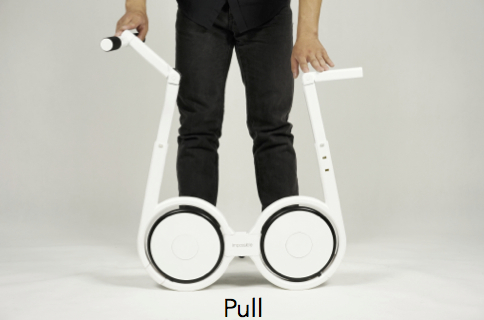 A white Impossible folding electric bike is in the Pull position.