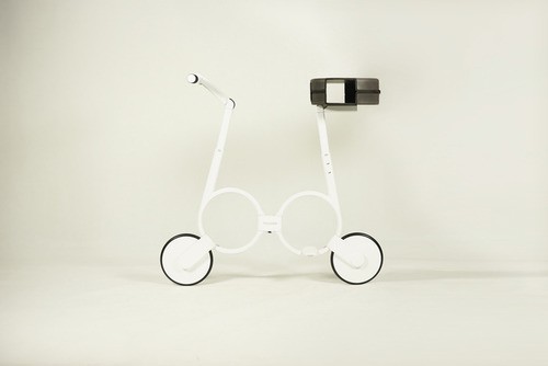 A side view of the white Impossible folding electric bike.