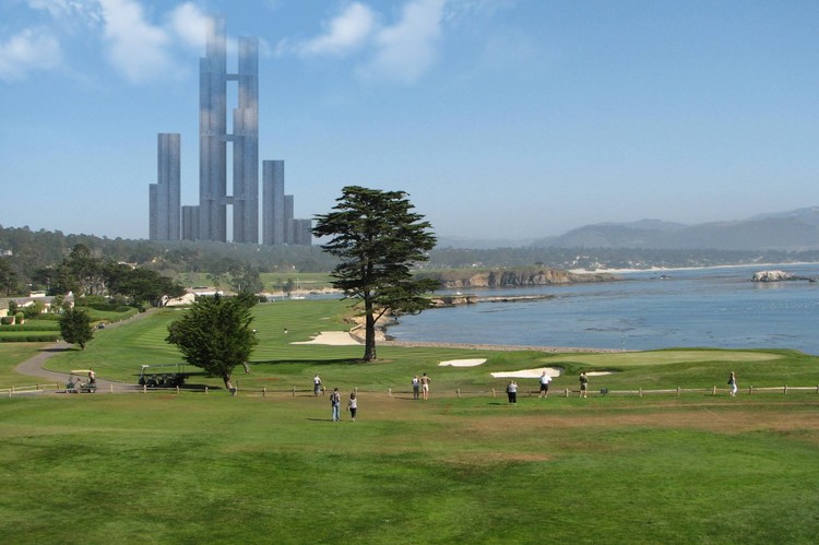 A vertical city skyscraper is shown during the daytime in beautiful weather and next to a park and body of water.