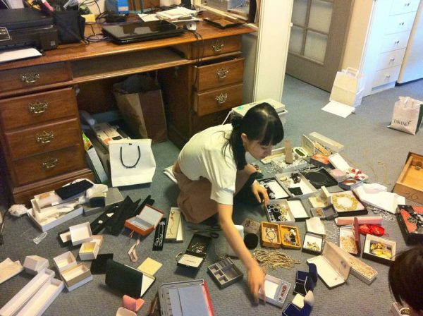 marie kondo tidying up and sorting items into categories