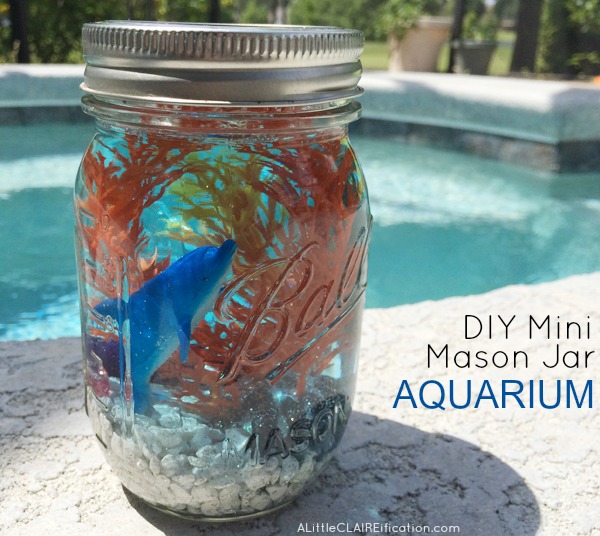 A DIY mason jar aquarium brings sea life into a kids bedroom in a tiny apartment.