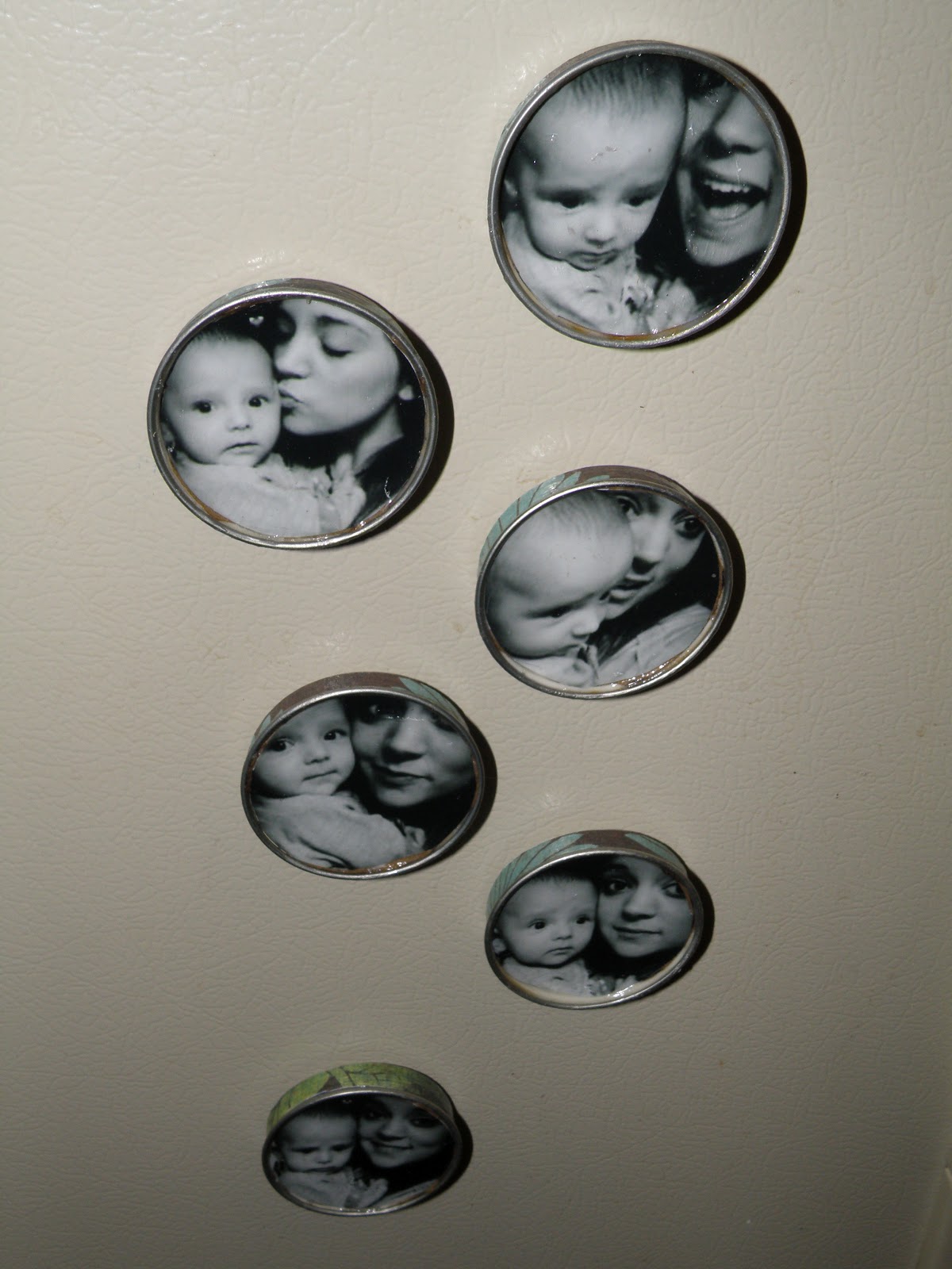 Cheap photo storage in a tiny apartment is easy with a DIY mason jar picture magnet.