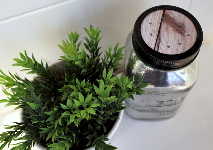 A DIY mason jar air freshener makes the bathroom inside your tiny apartment smell nice.