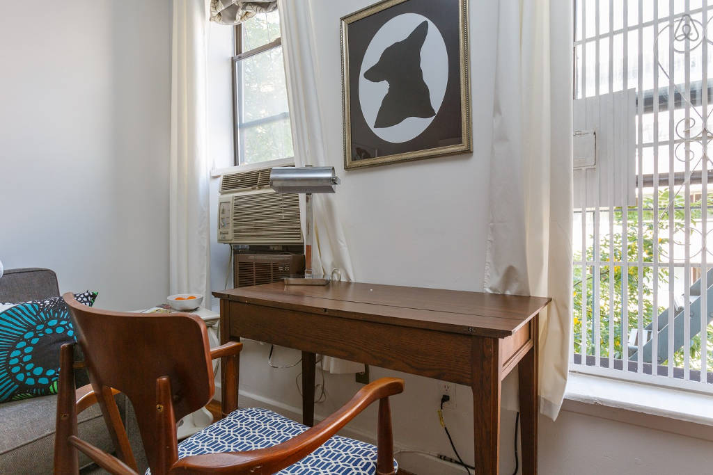 MicroGreens founder Alli Sosna has a transforming desk with storage in her tiny NYC apartment in the East Village.