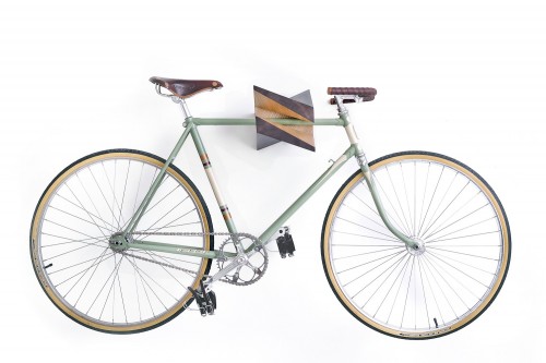 The wooden Iceberg Chestnut is an X-shaped bike storage rack that doubles as fine art.