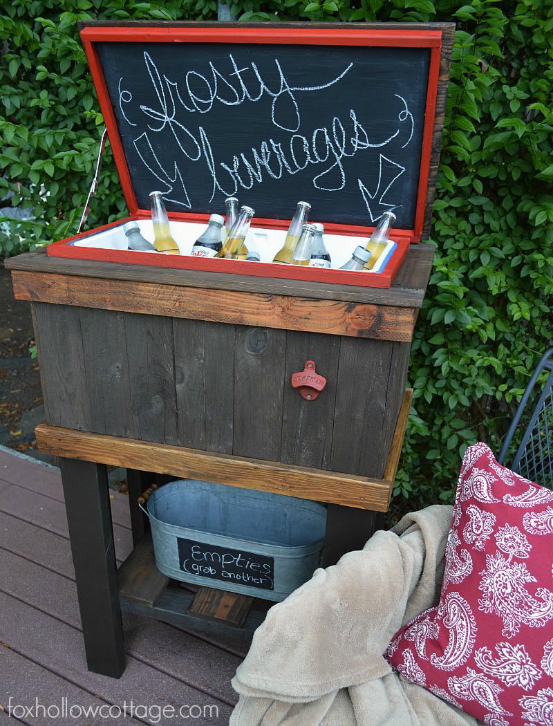 A DIY wooden pallet cooler with drink and beer storage space.