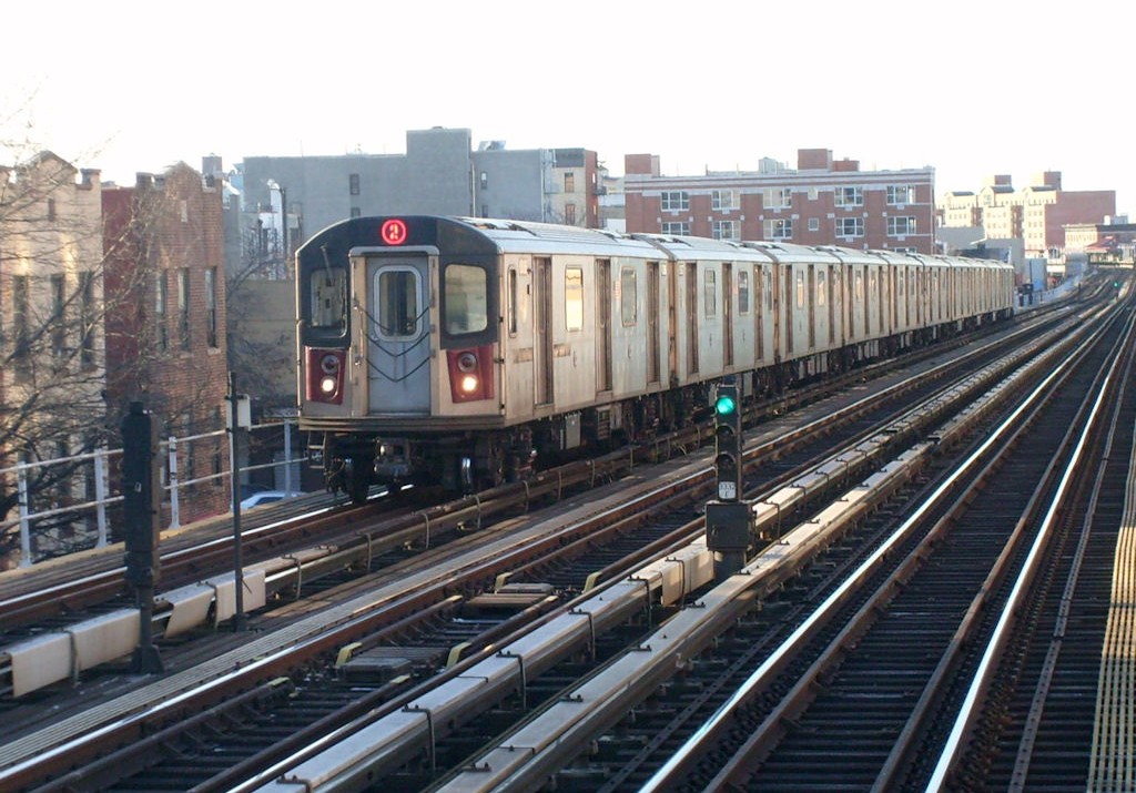 The 2 train entering the east 174th street station in the Bronx, Manhattan NYC.