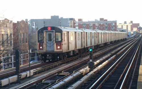 The 2 train entering the east 174th street station in the Bronx, Manhattan NYC.