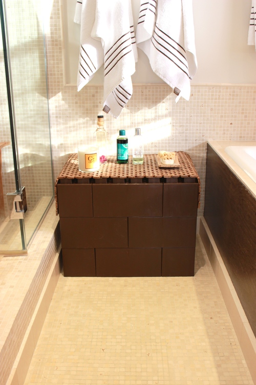 A giant brown LEGO table made from EverBlocks.