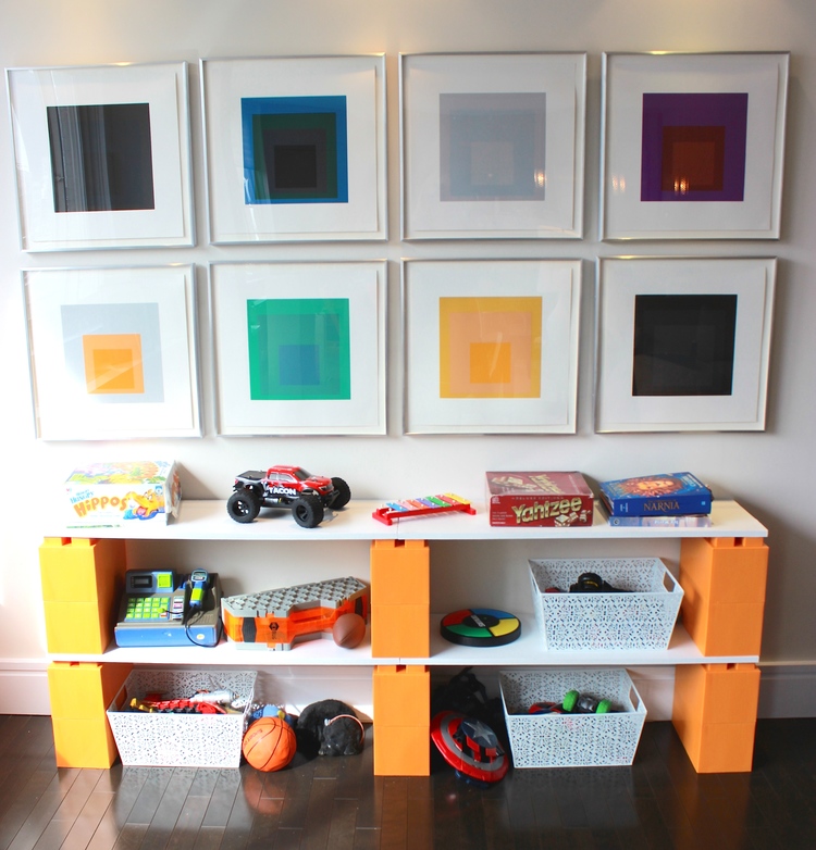 These orange EverBlocks, which look like big LEGOs, make cheap shelves with toy storage.
