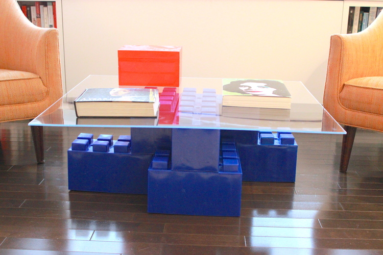 A blue giant LEGO coffee table made of EverBlocks.