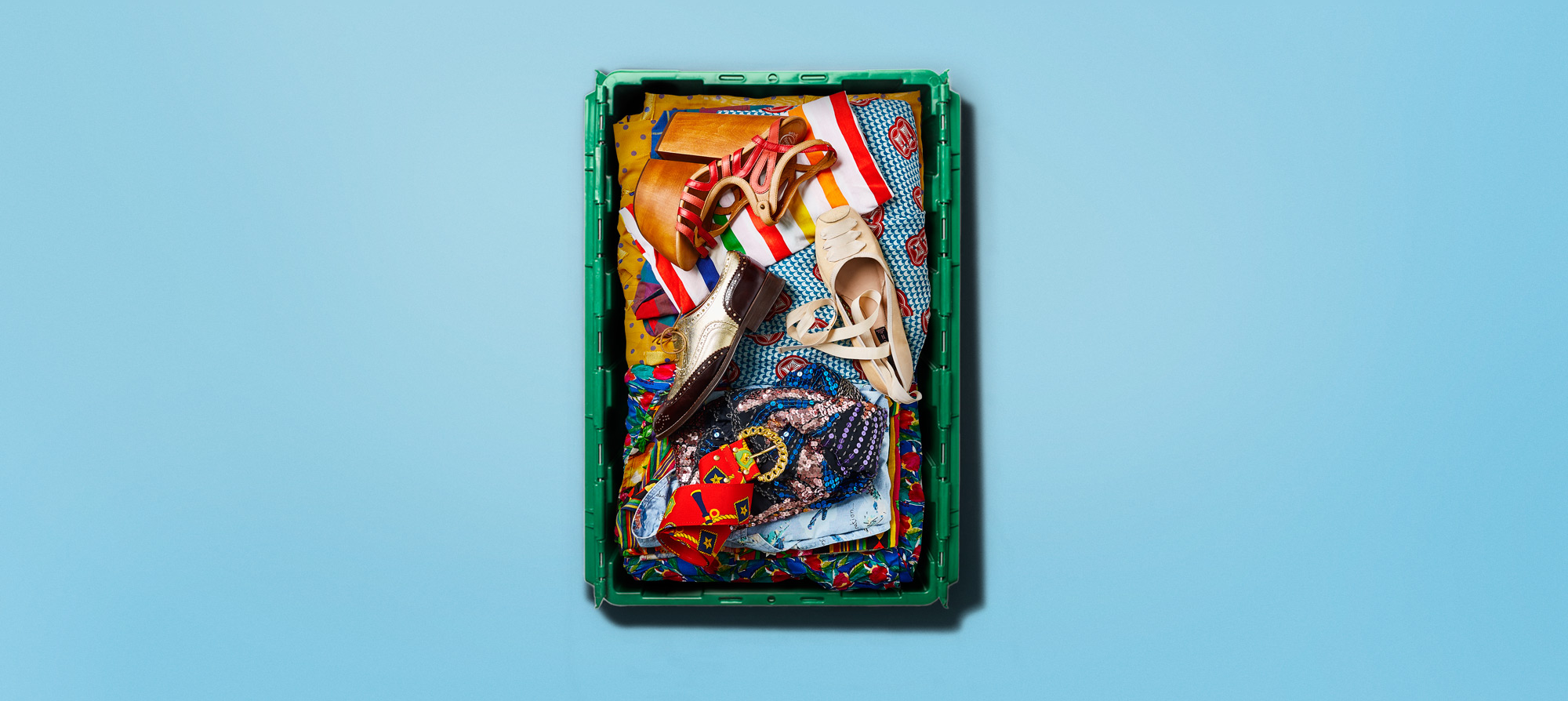 A MakeSpace bin stores vibrant clothes and shoes that belong to Joanna Matthy, an Urban Outfitters project manager who lives in Bushwick, Brooklyn.
