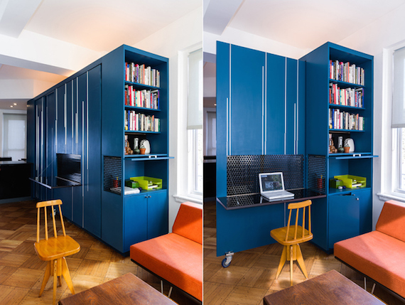 The office/library inside of the blue multipurpose furniture/storage cabinet in Unfolding Apartment, a tiny apartment that's located in Manhattan NYC.