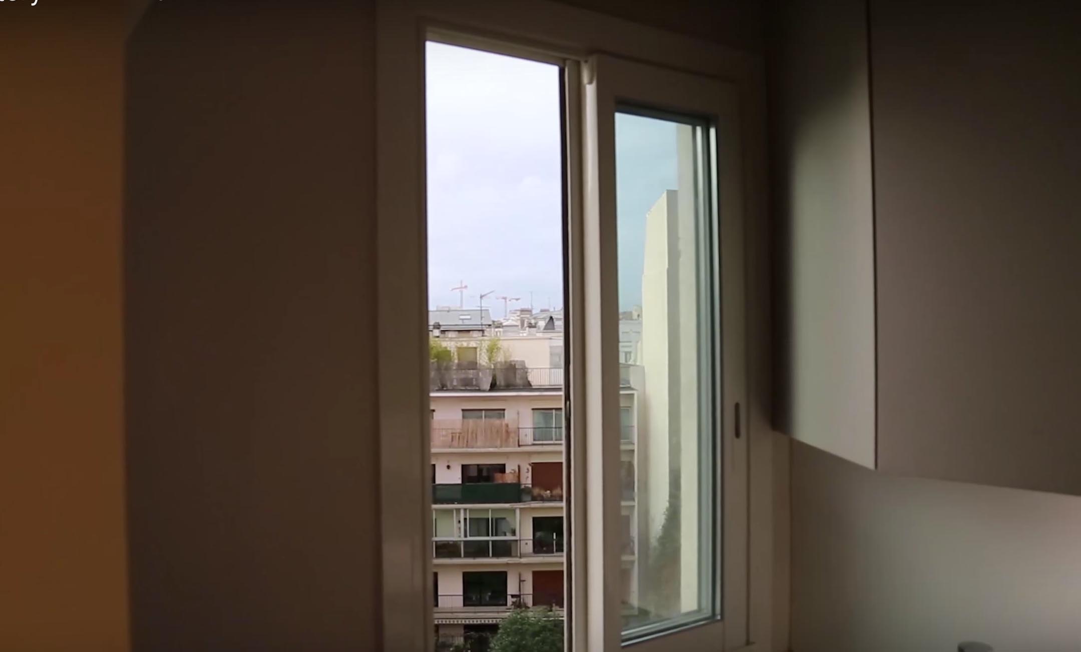 A daytime view from French Redditor Lurluberlu’s bedroom window in Paris, France shows apartments, not the Eiffel Towel.