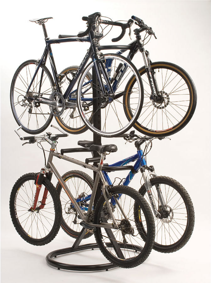 A Quad Bike Storage Rack from Brookstone stores four bikes vertically in a small apartment.