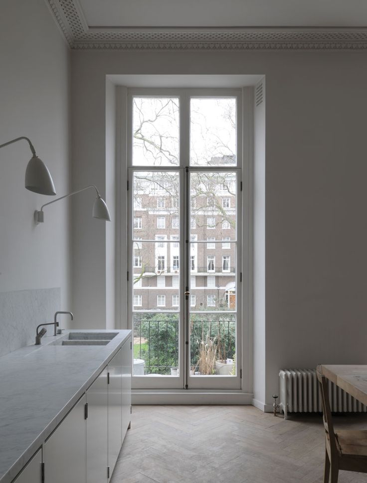kitchen-with-a-large-window-and-minimalist-design