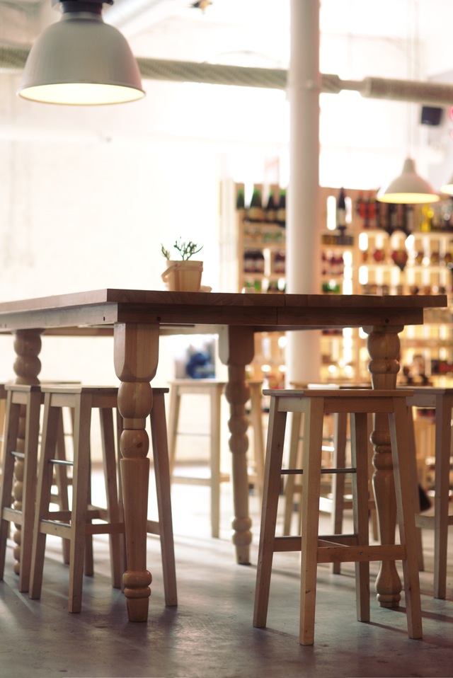 Save space in a small kitchen by adding wooden stools.