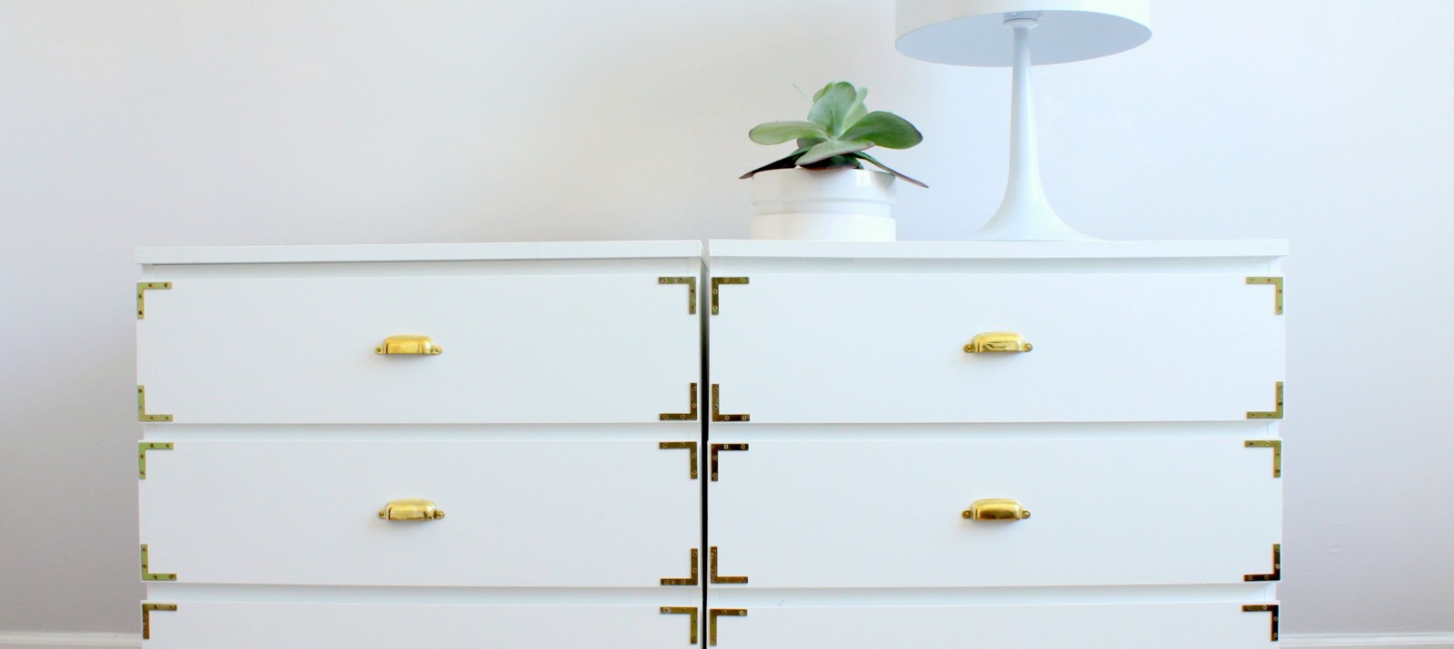 An IKEA hack made of white MALM drawers in a small apartment.