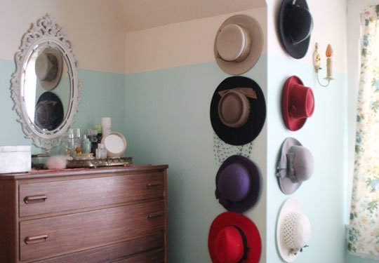 Storage ideas for small spaces: nail hat storage hooks.