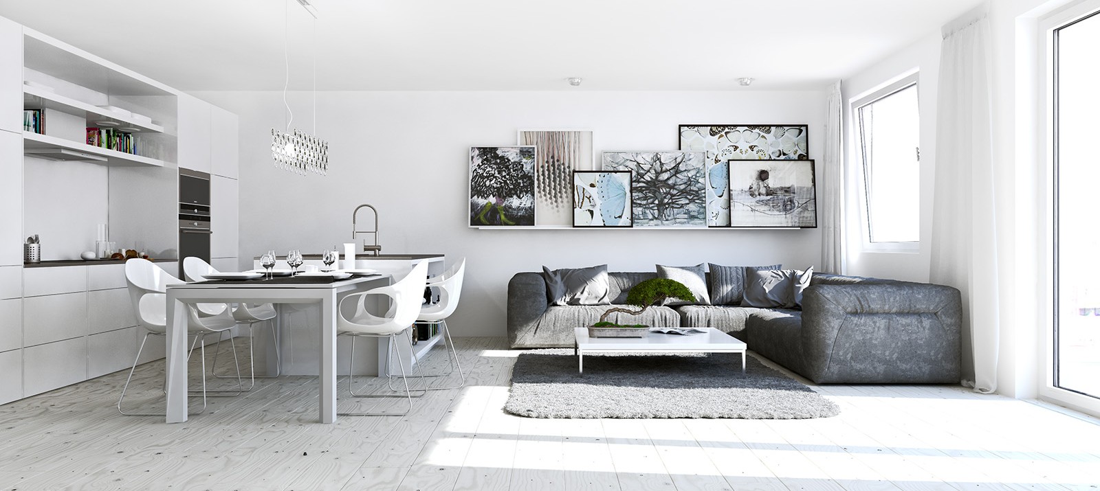 A white interior in a studio apartment reflects light to make a room feel bigger.