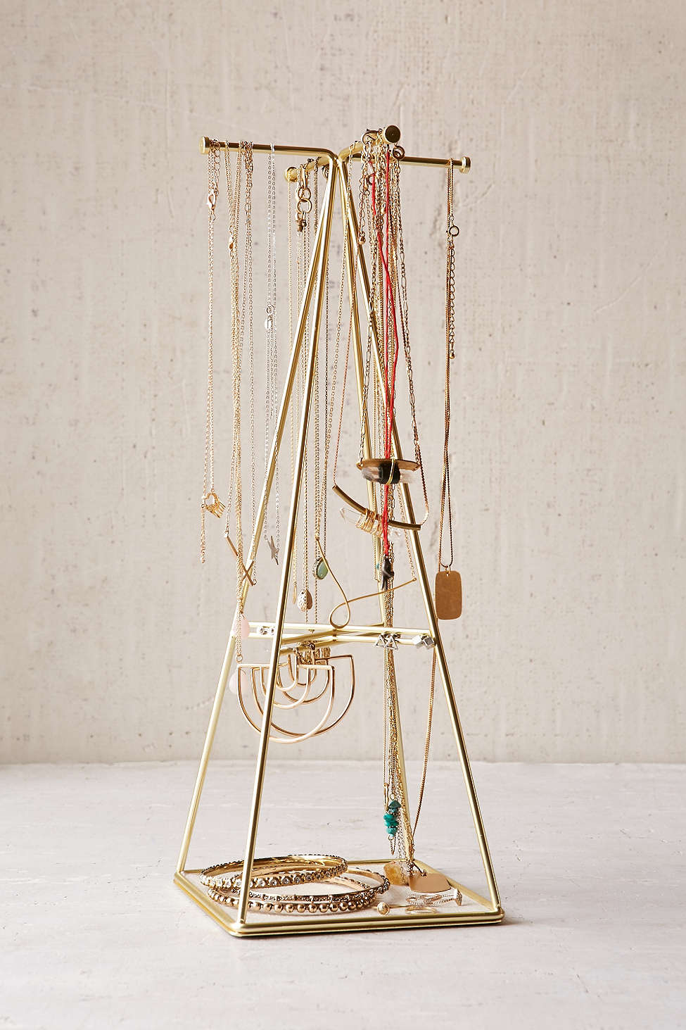 A brass-plated linen-lined Umbra Prisma Large Jewelry Organizer from Urban Outfitters is a perfect Valentine's gift for her.