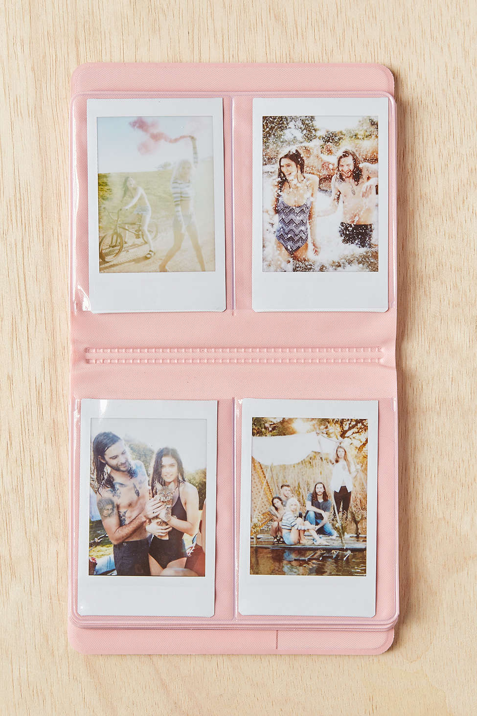 An Instax Photo Album from Urban Outfitters used for photograph storage is a creative Valentine's day gift for boyfriend or girlfriend.