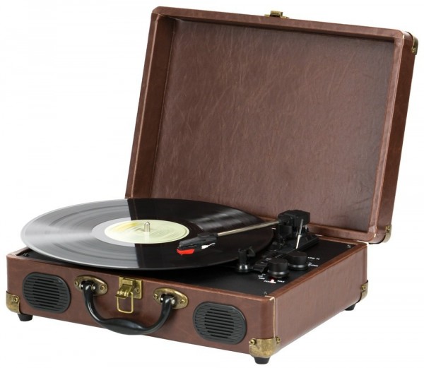 A brown QFX TURN-101 Retro Collection Suitcase Turntable is playing a vinyl record.