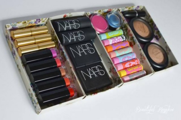 A DIY makeup storage and organizing solution made from Christmas gift boxes.