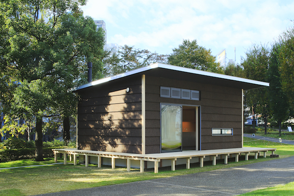 The exterior of a MUJI Cork Hut, a prefab home in Japan.