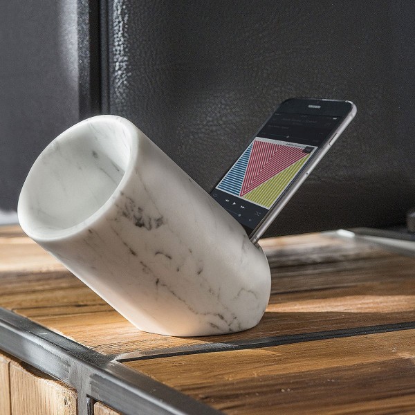 A small OVO iPhone speaker made of marble.