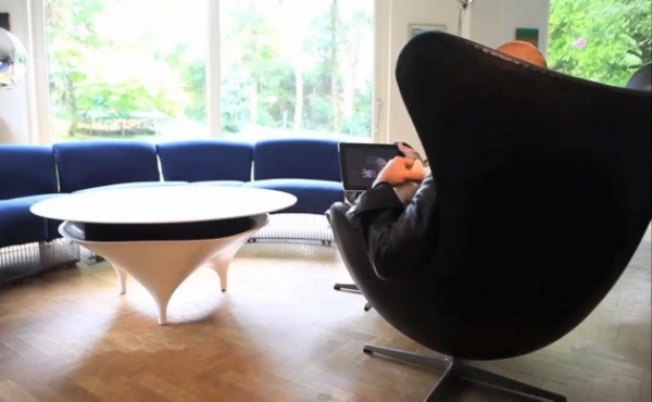 A space-age Acoustable speaker/coffee table made from a polymer and mineral blend.