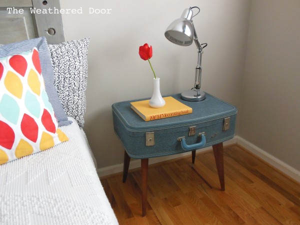 A DIY side table made from a vintage suitcase.