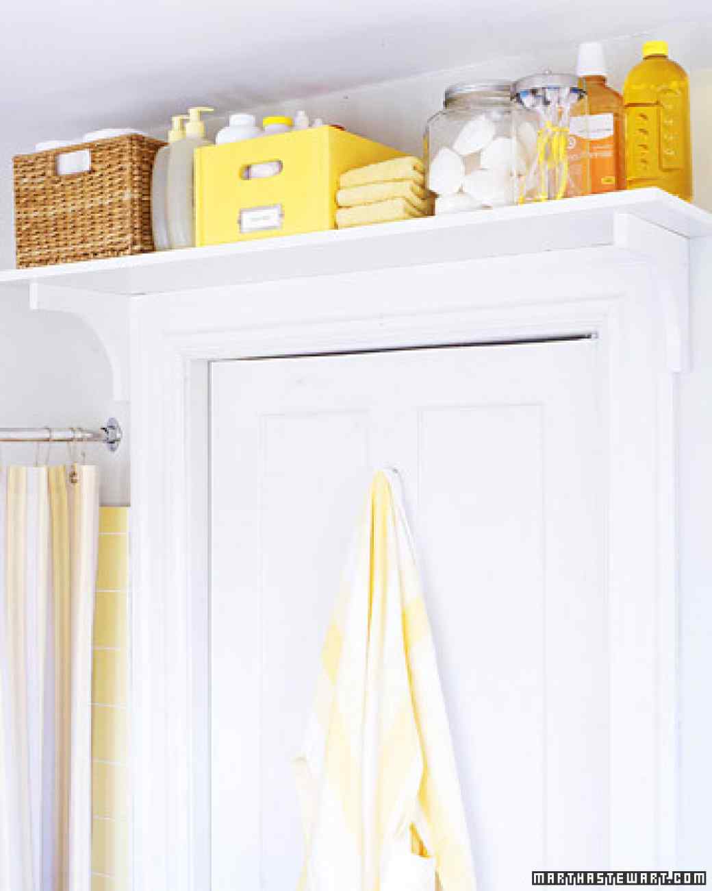 install a shelf on top of your bathroom door to store extra grooming and personal hygiene products
