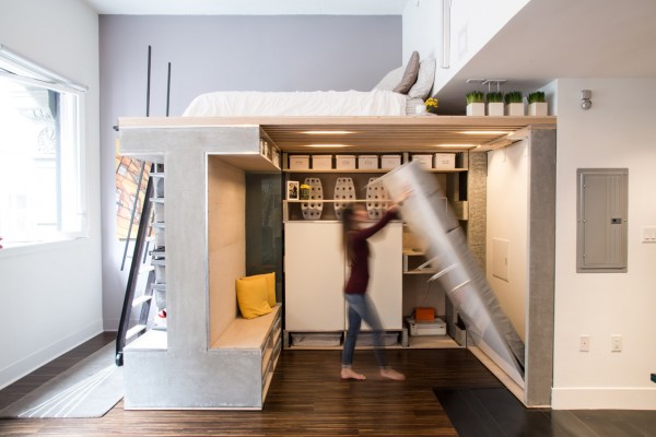 Nicki Wang opens the Domino Loft system's Murphy bed.