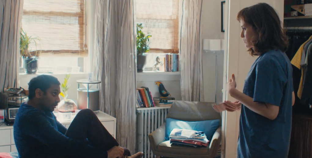 Aziz Ansari's Dev from Master of None and his girlfriend Rachel use a radiator shelf and windowsills as a cheap storage hack and book organizing trick in their NYC apartment.