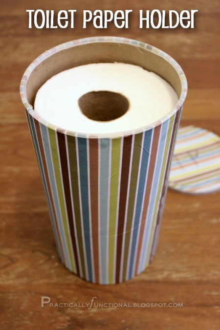 a decorated oatmeal cannister used for toilet paper storage
