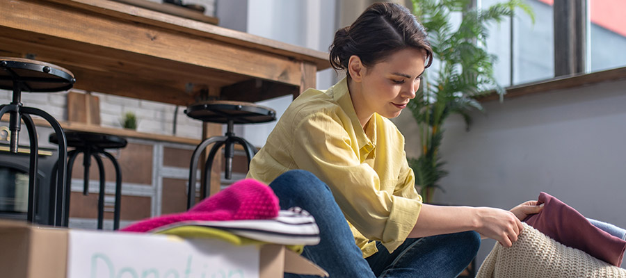 a woman decluttering and organizing her home