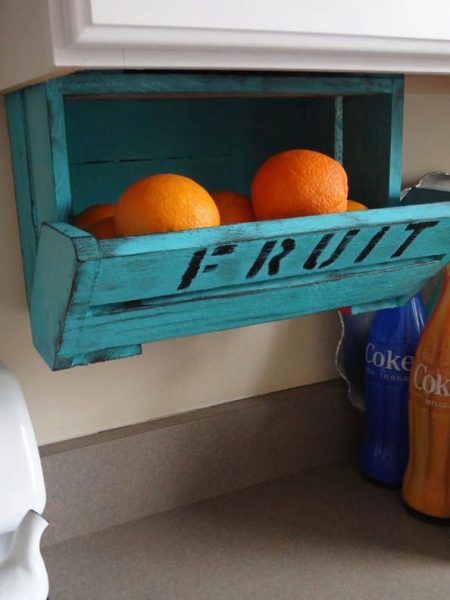 fruit storage hack: under-cabinet orange holder made from a wood pallet