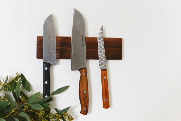 space-saving diy storage: a wall-mounted wooden magnetic knife holder