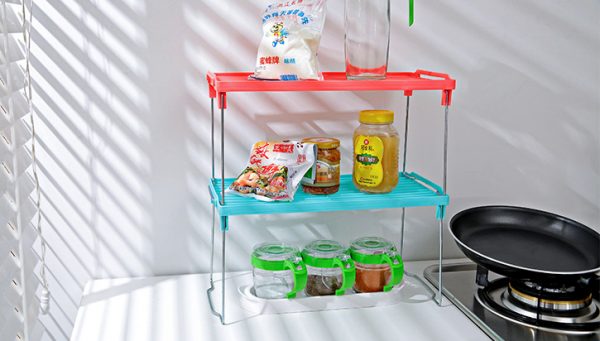 stacking small bathroom shelves on a kitchen counter is an easy storage tip