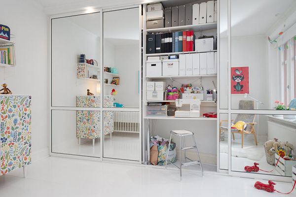 bedroom closet sliding mirror door and storage shelves