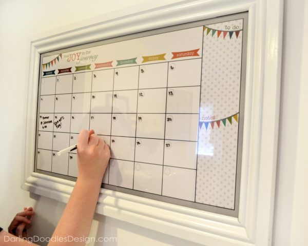 write moving day on diy dry erase calendar