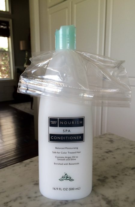 plastic wrap on conditioner bottle to prevent spills when moving to a new home