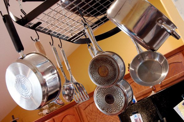 hanging pot rack attached to kitchen ceiling