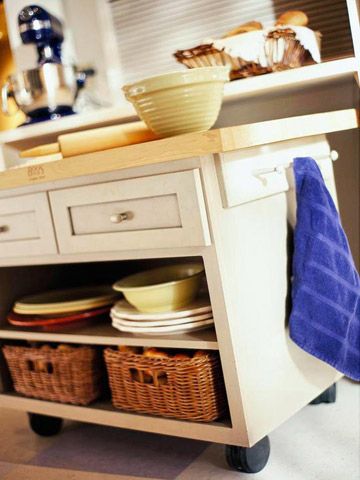 kitchen island towel holder made from a coat rack with pegs