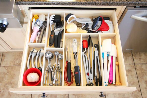 diy kitchen drawer organizer storing cooking supplies