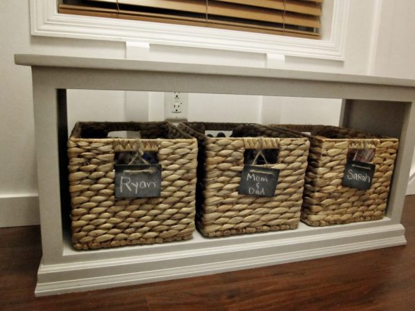 diy shoe baskets and storage bench in an entryway